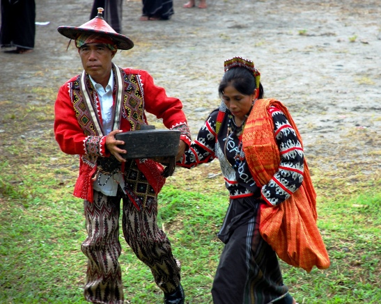 tribal leaders bringing symbolic offerings
